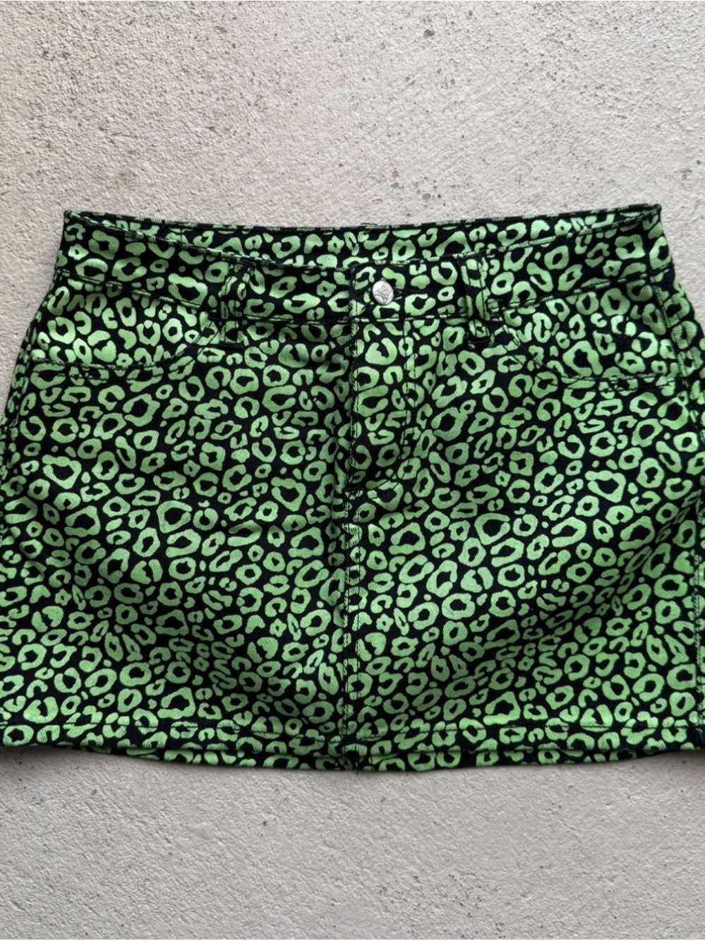 SOURPUSS green leopard print mini skirt